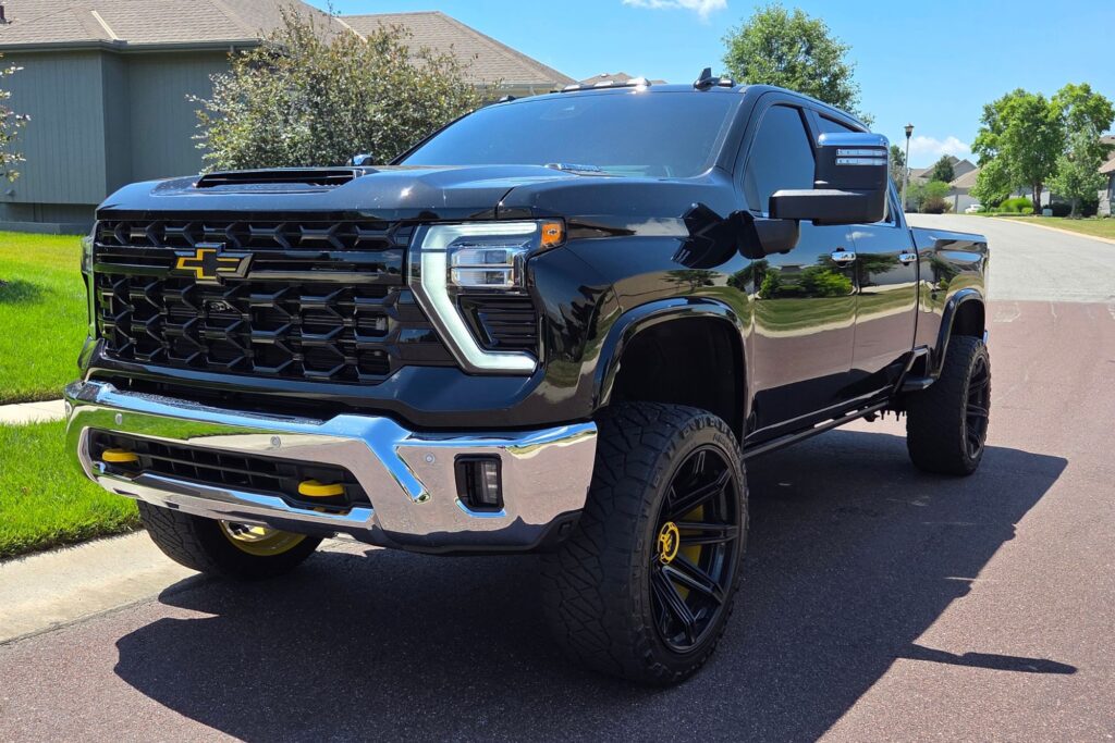 DI Demo Truck. Aftermarket Fuel Wheels with custom painted barrels, Custom painted control arms, Custom painted Bowtie badging, tinted tail lights, window tint, and tires